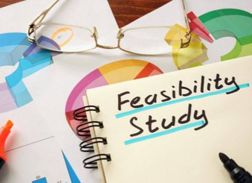 Image of a notepad with Feasibility Study written on it 